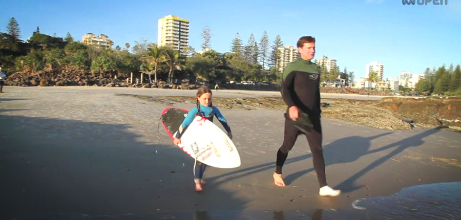 Surfing in the age of 6: Quincy is one of the biggest in the water