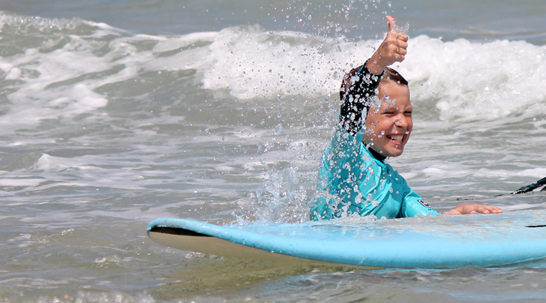 happy young surfer